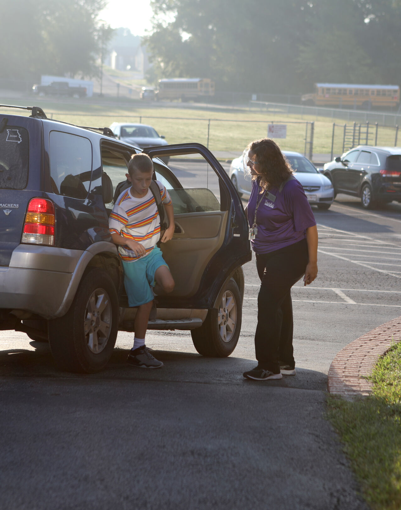 Jessica Tollison opens the car door